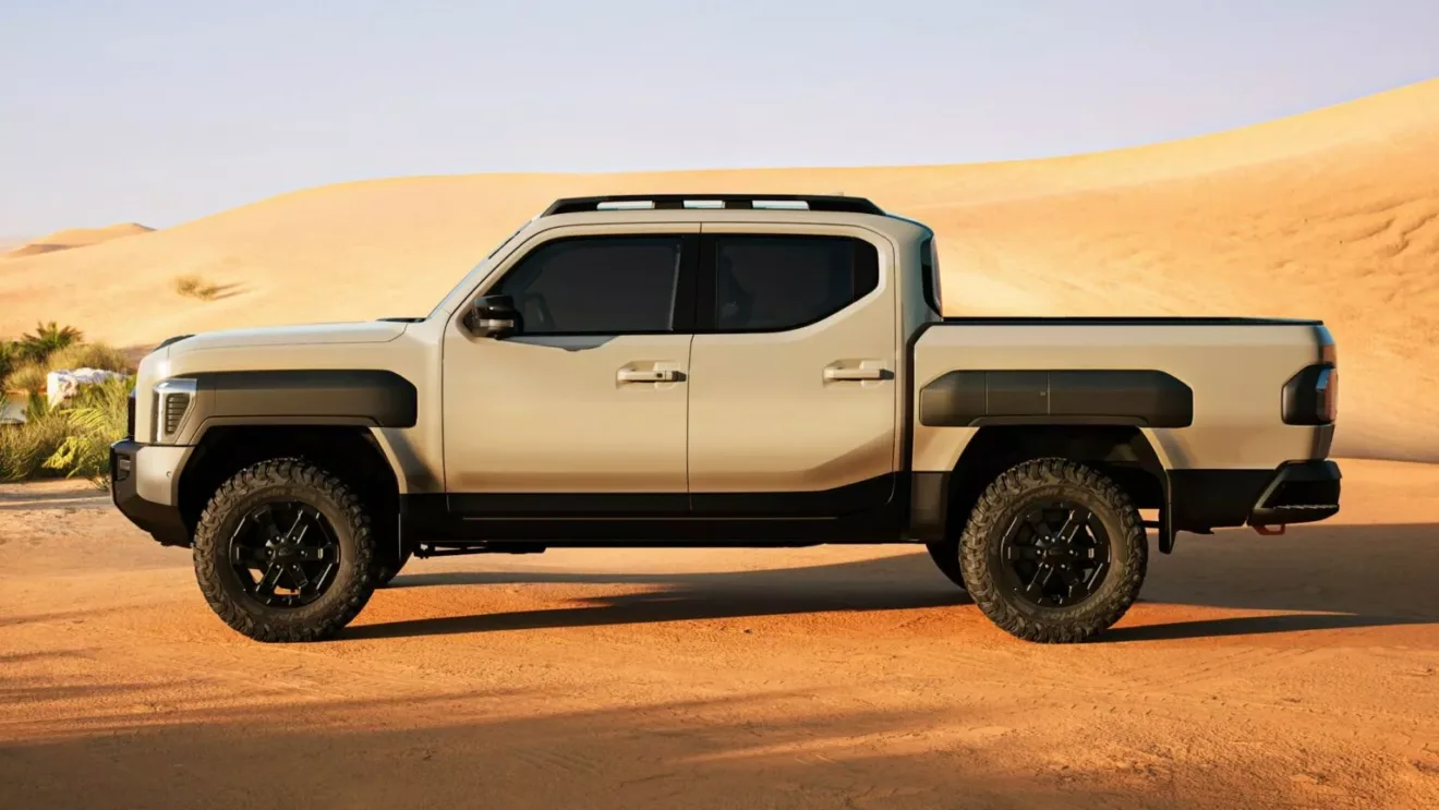 Nova picape Kia Tasman bege em foto lateral no deserto