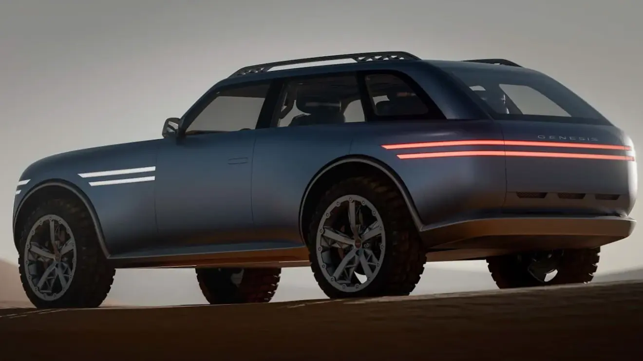 Vista da traseira do Genesis X Gran Equator cinza com lanternas acesas