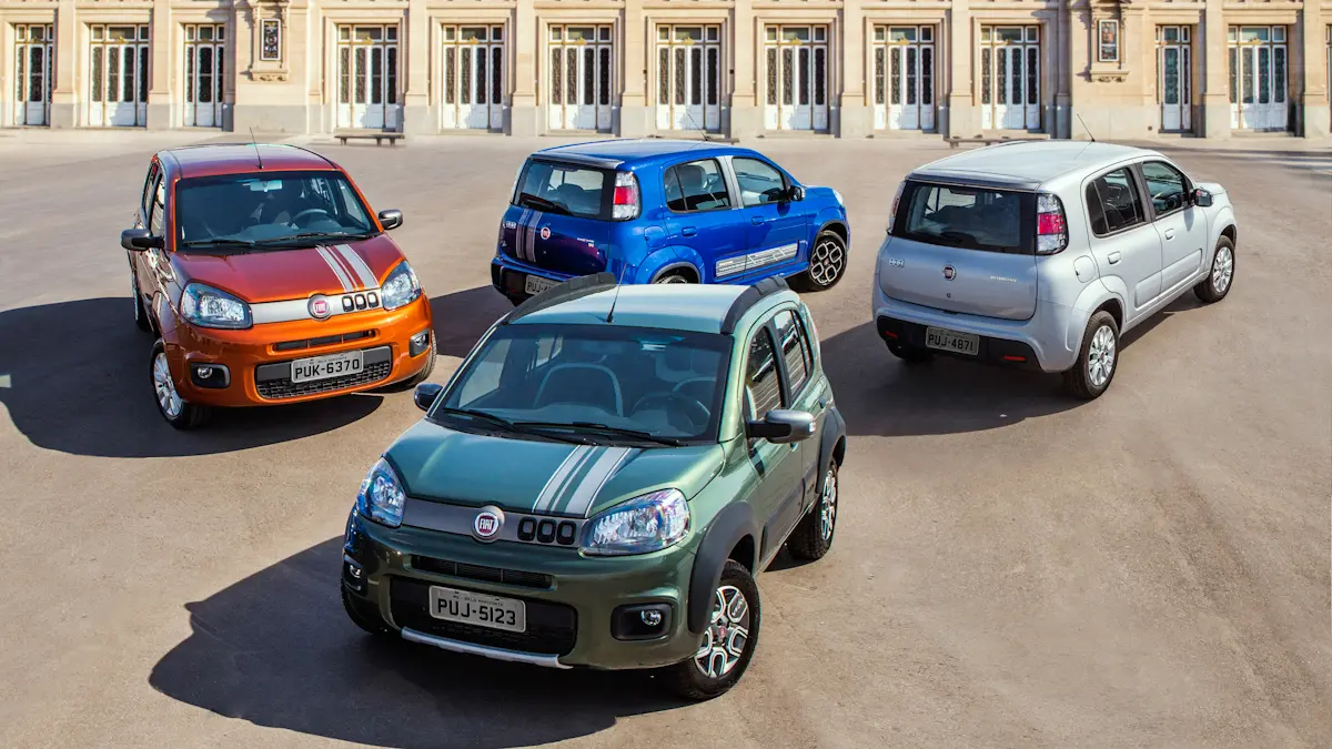 Fiat Uno evolution laranja, uno attractive azul, uno vivace prata e uno way verde