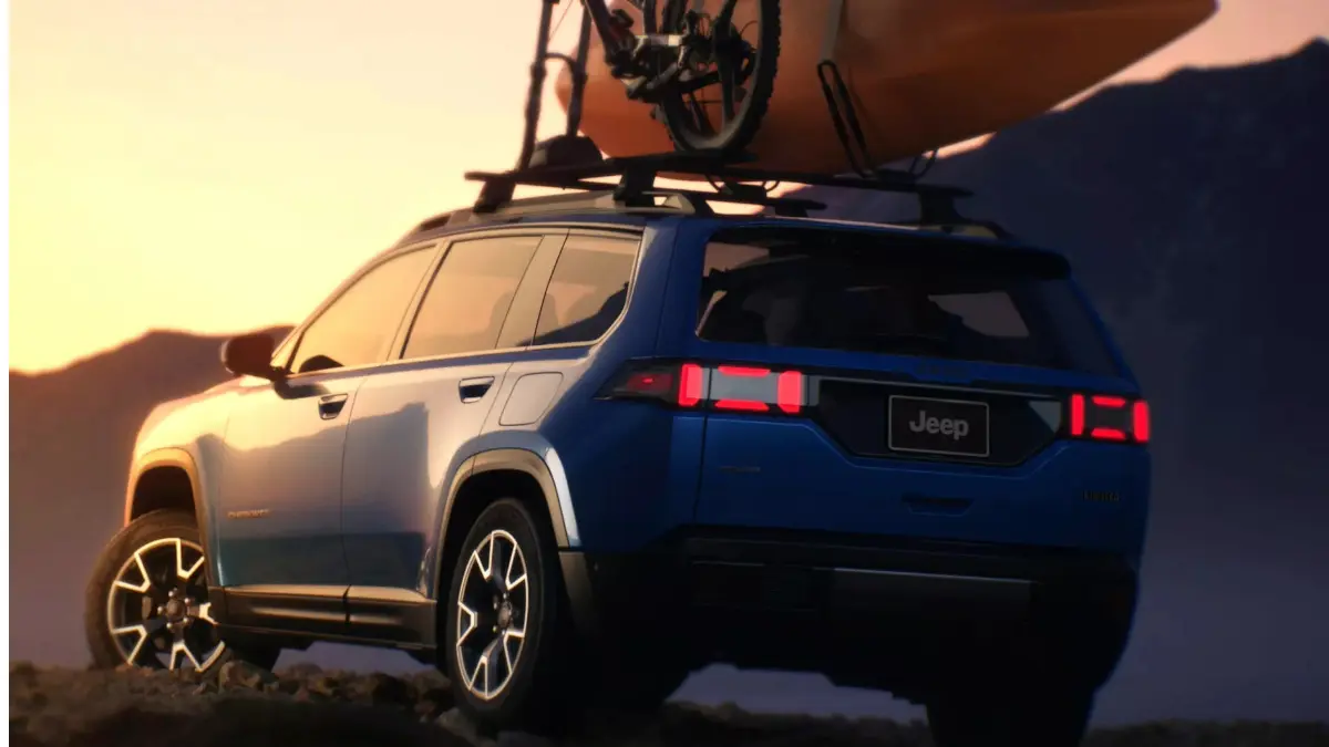 Teaser da traseira do Jeep Cherokee de nova geração azul