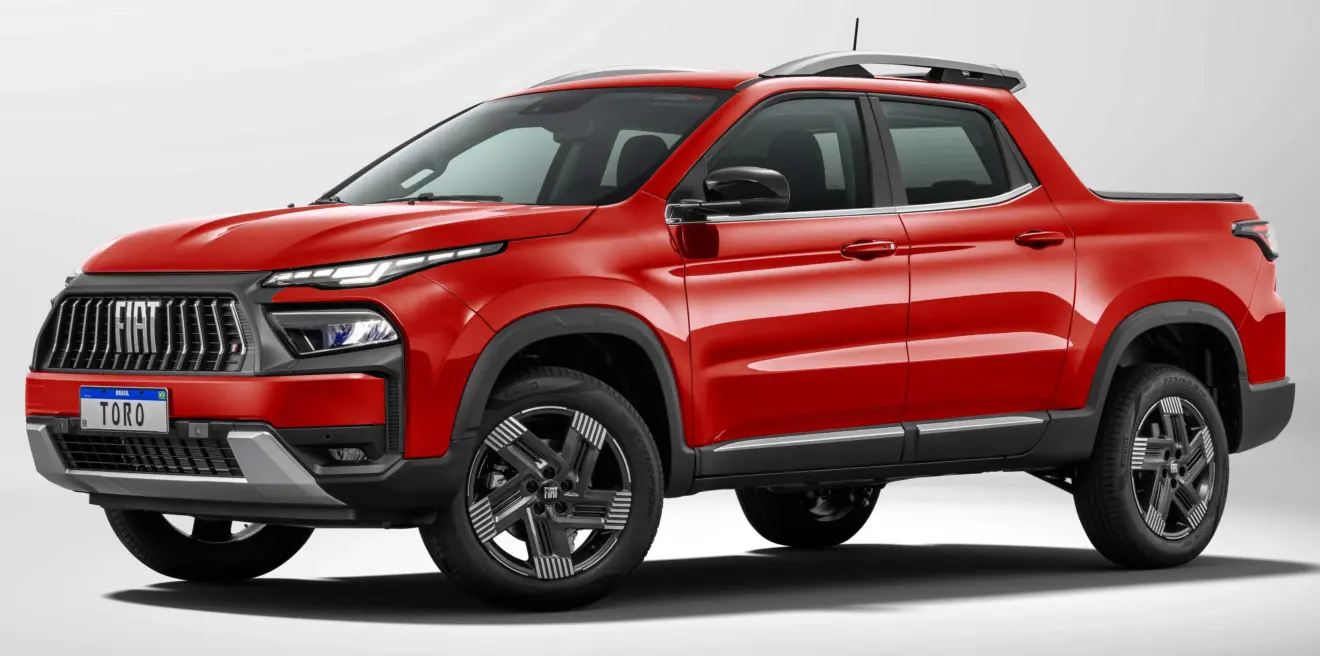 Fiat Toro Volcano 2026 vermelha parada de frente com fundo neutro