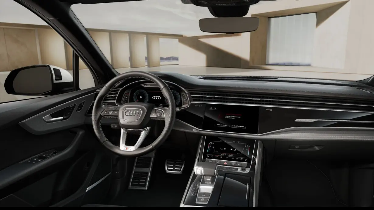 Interior do Audi Q7 S Line TFSI Quattro com telas ligadas