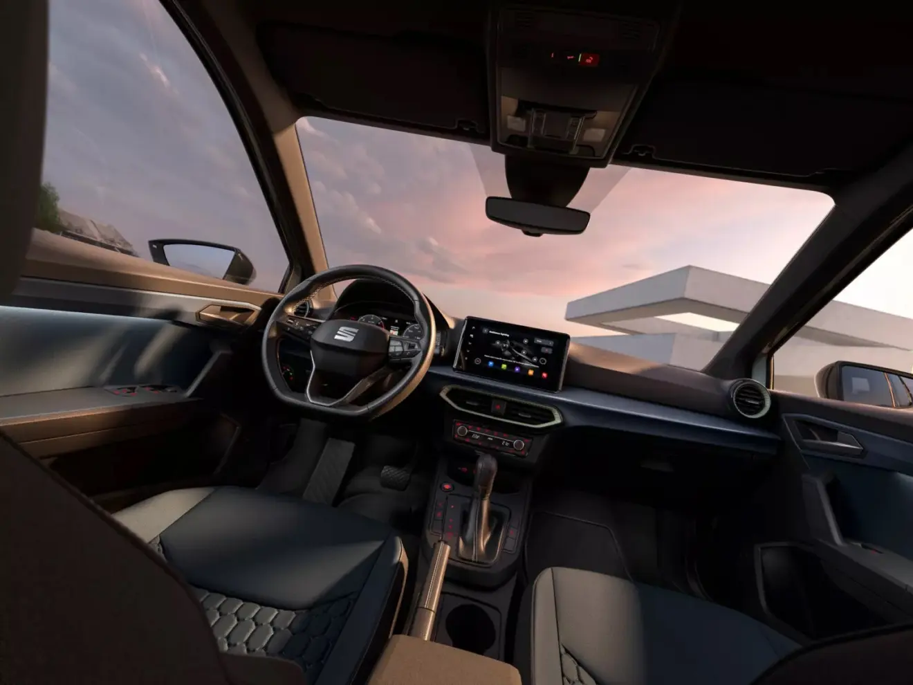 Interior do Seat Arona 2026 com telas ligadas