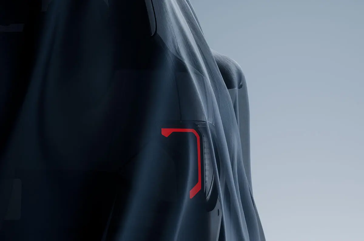 teaser da traseira do Kia EV2 com lanterna acesa