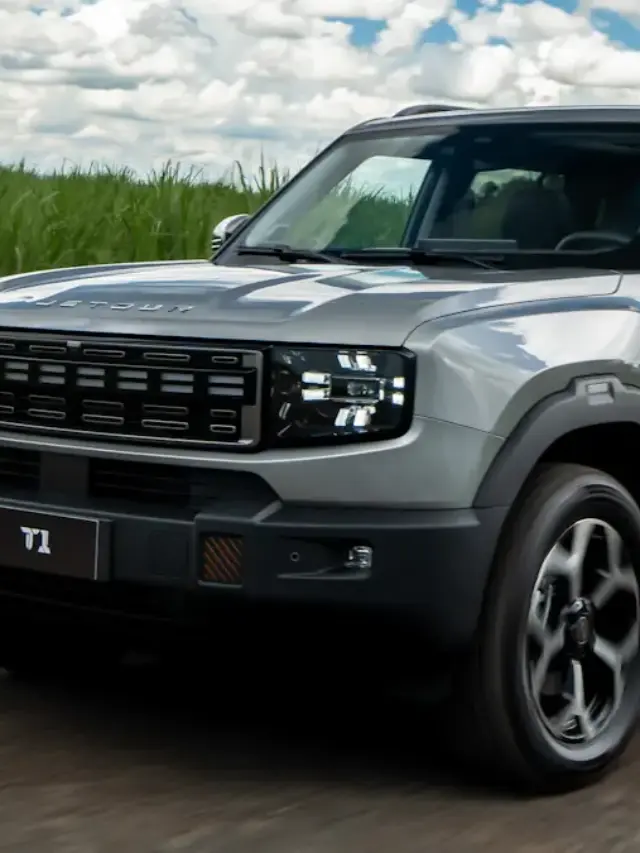 Jetour T1 cinza de frente no asfalto