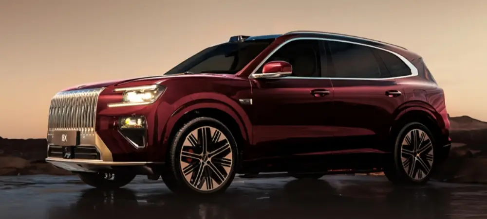 Zeekr 8X vinho visto de frente e com iluminação acesa