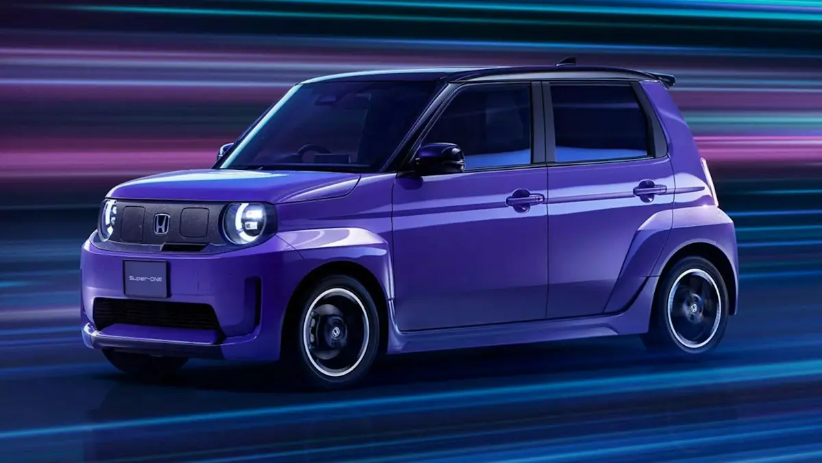 Honda Super-One roxo de frente acelerando