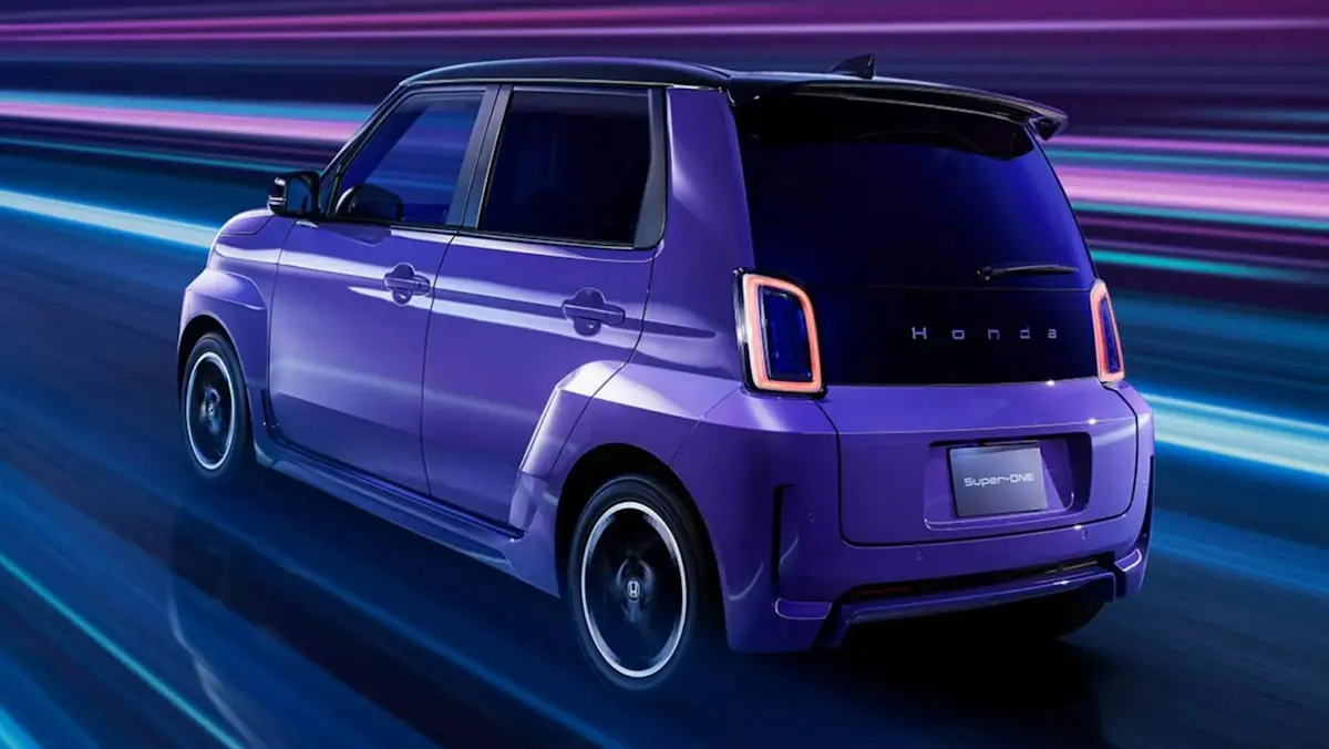Honda Super-One roxo de traseira acelerando