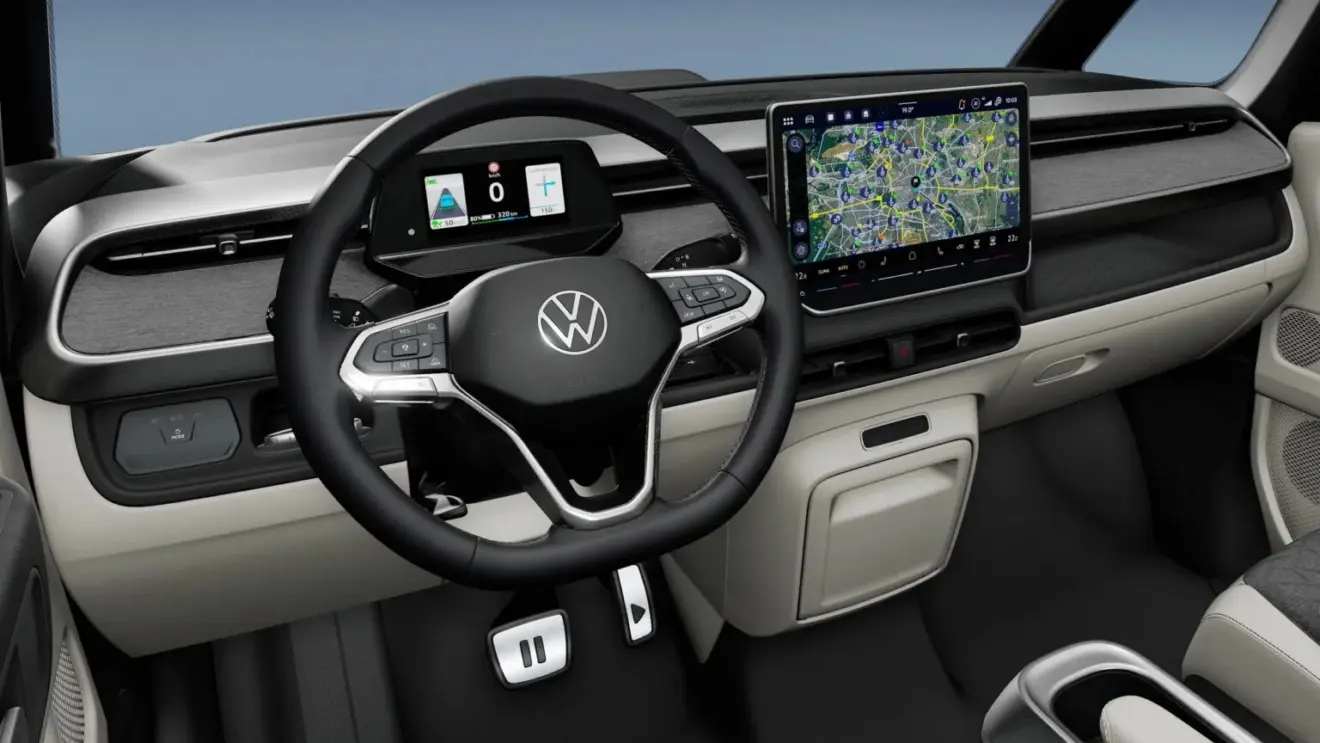 Interior da Volkswagen Kombi elétrica 2026 com telas ligadas