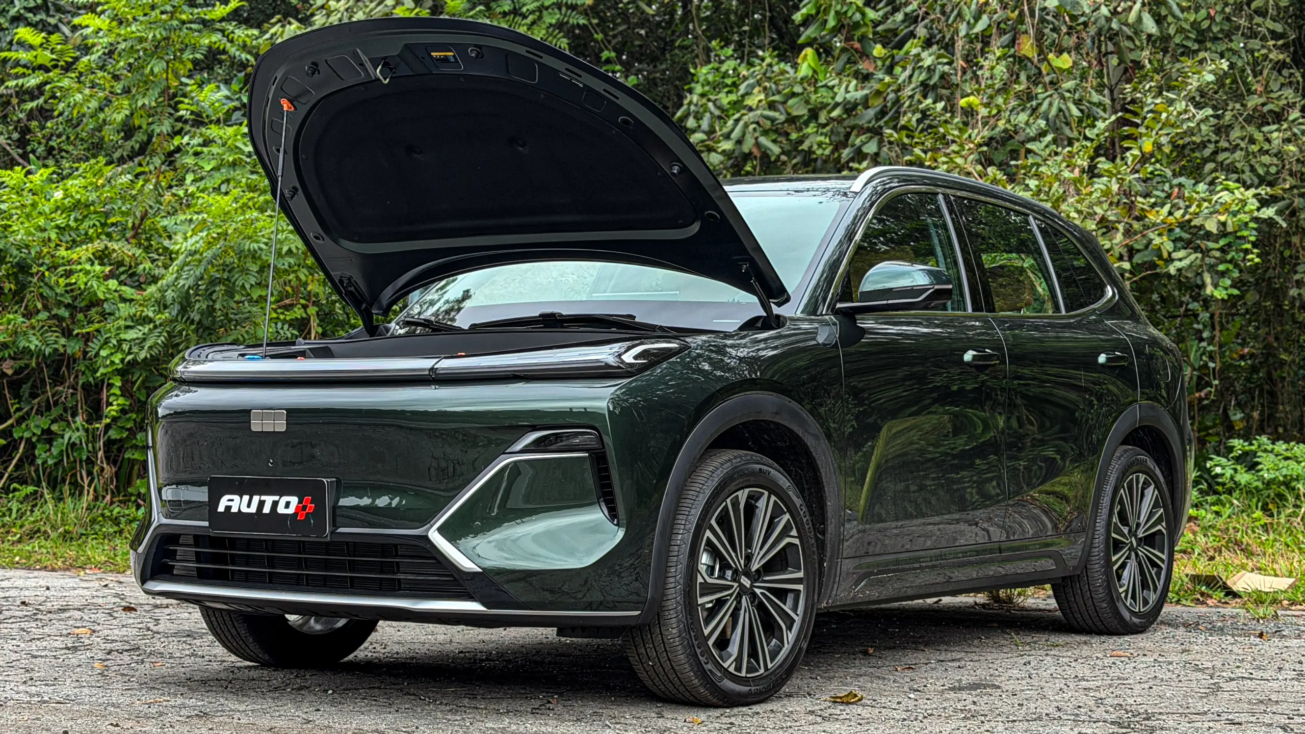 Geely EX5 EM-i verde estático para avaliação e teste