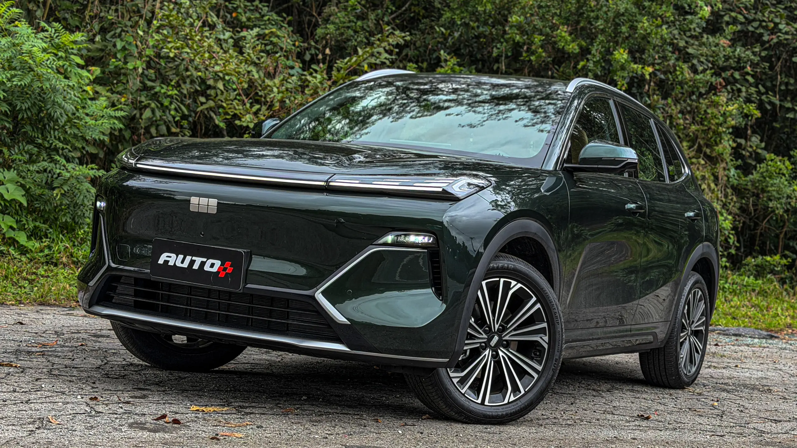 Geely EX5 EM-i verde estático para avaliação e teste