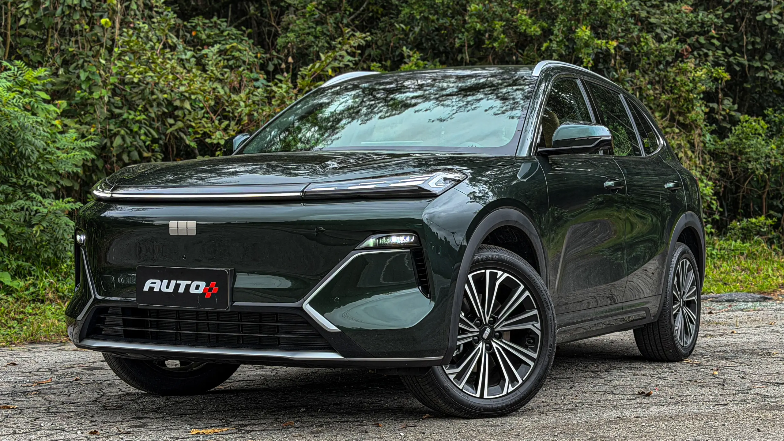 Geely EX5 EM-i verde estático para avaliação e teste