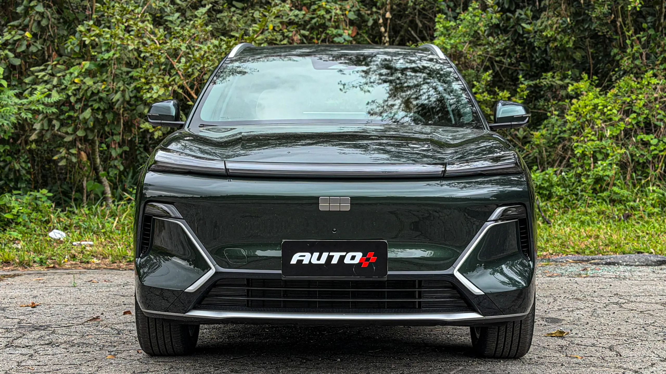 Geely EX5 EM-i verde estático para avaliação e teste