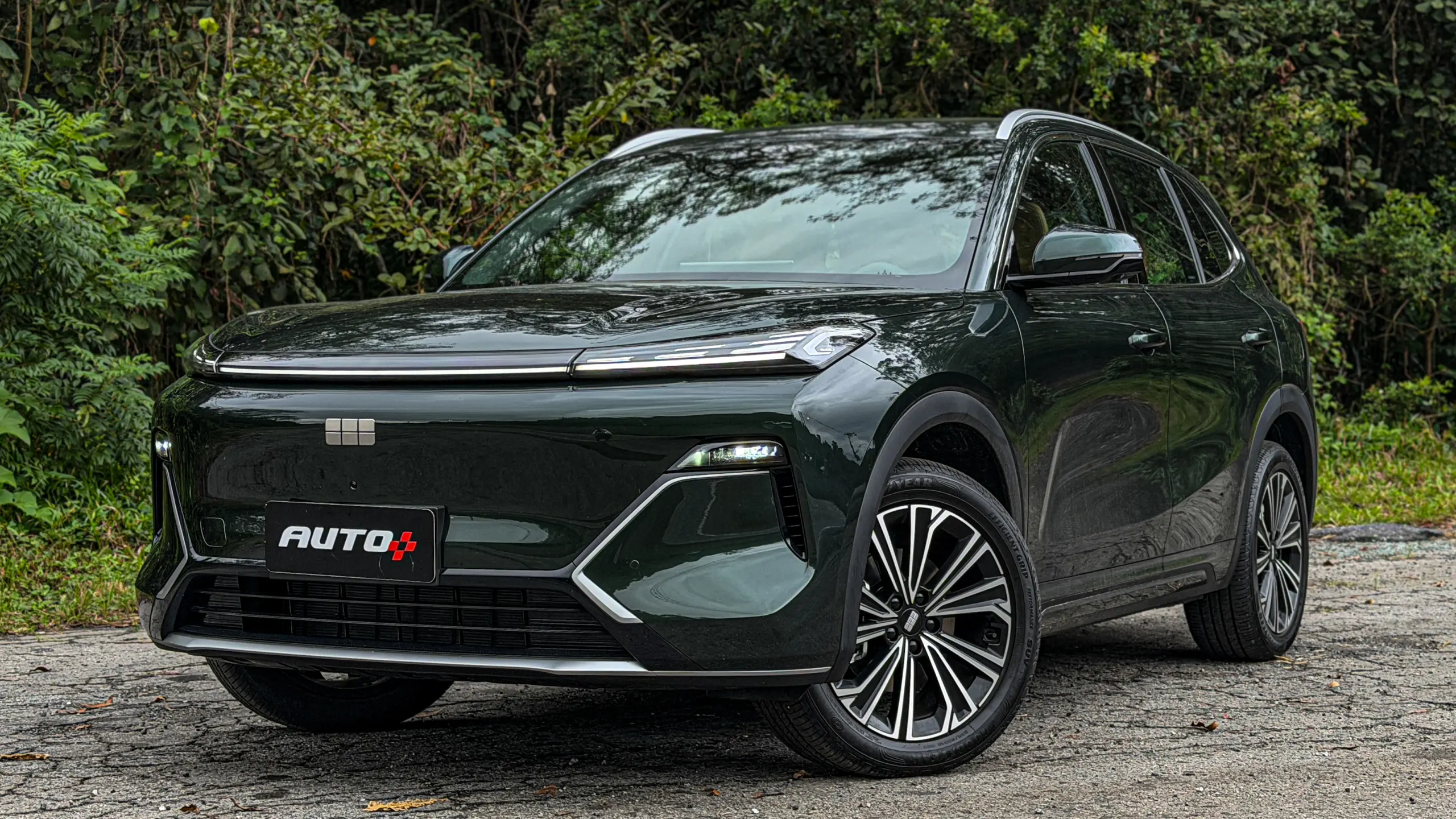 Geely EX5 EM-i verde estático para avaliação e teste