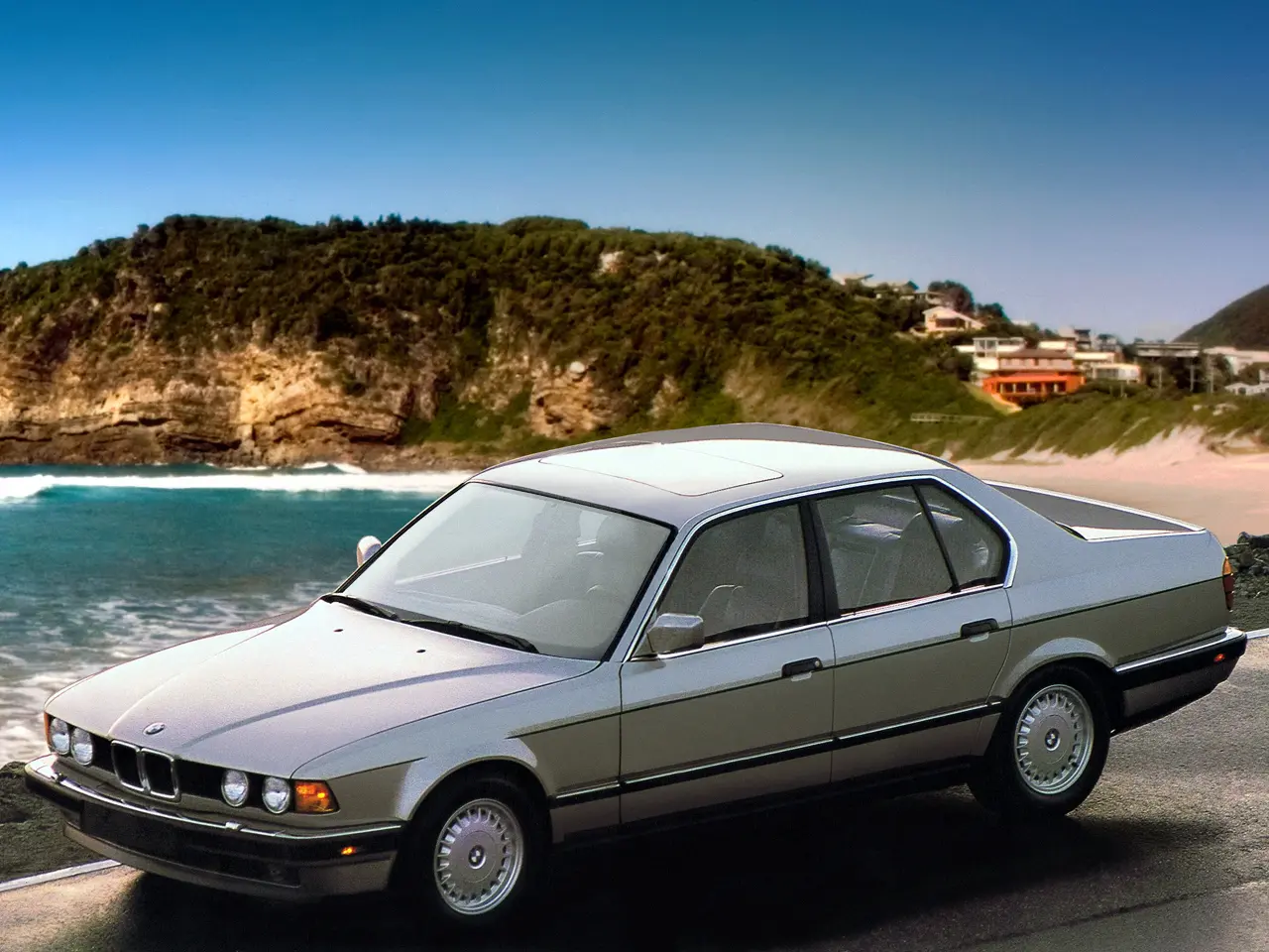 BMW Série 7  cinza parado de frente parado de frente usa uma tecnologia vinda dos aviões de caça