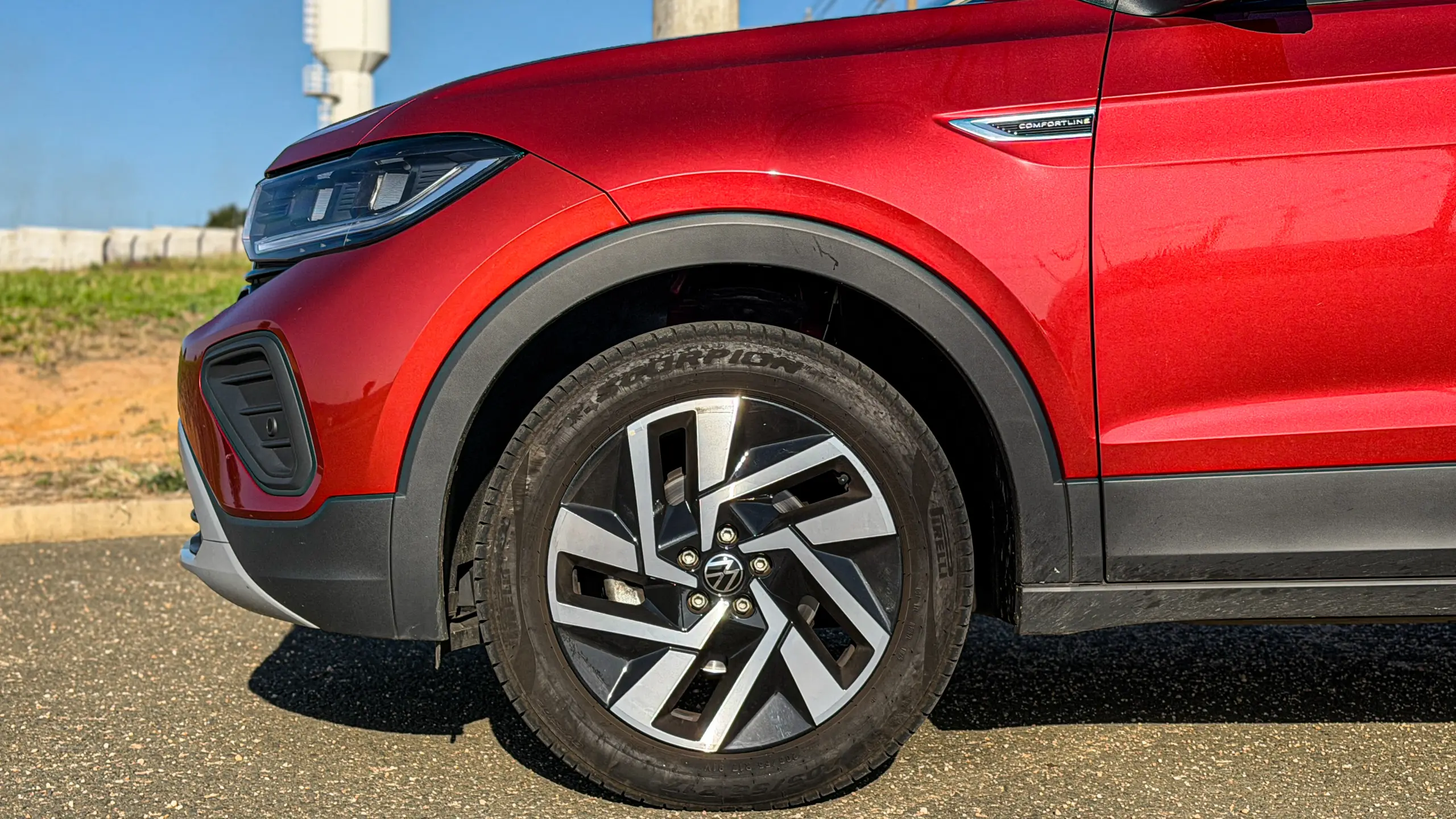 Volkswagen T-Cross Comfortiline Vermelho Sunset estático