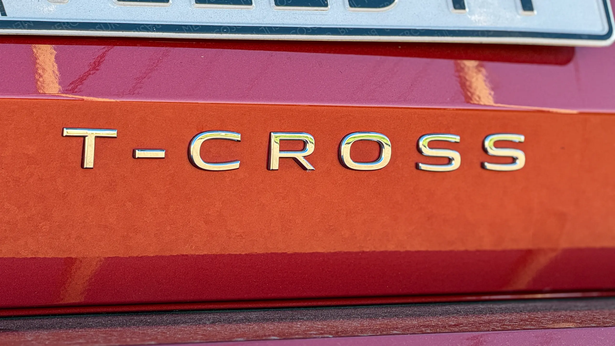 Volkswagen T-Cross Comfortiline Vermelho Sunset estático