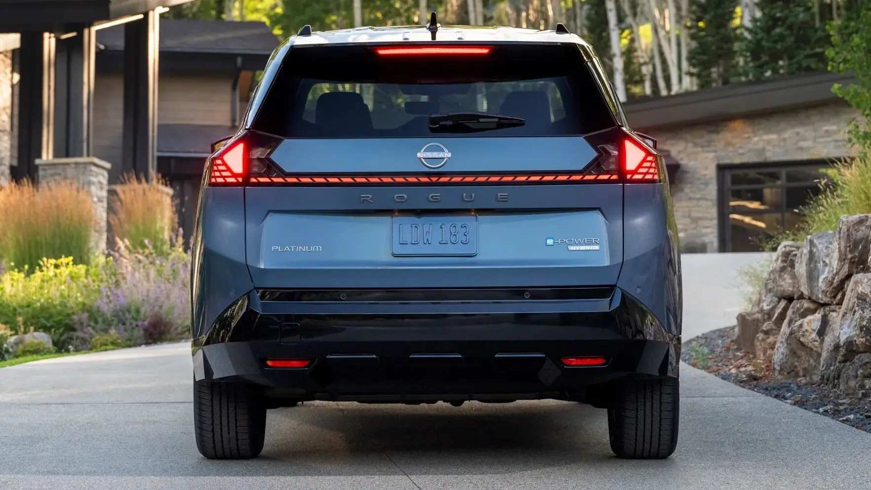 Nissan Rogue/X-Trail na cor azul