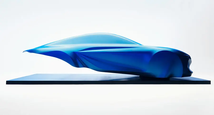 Escultura Alpine A110 azul de lado adianta novo esportivo elétrico