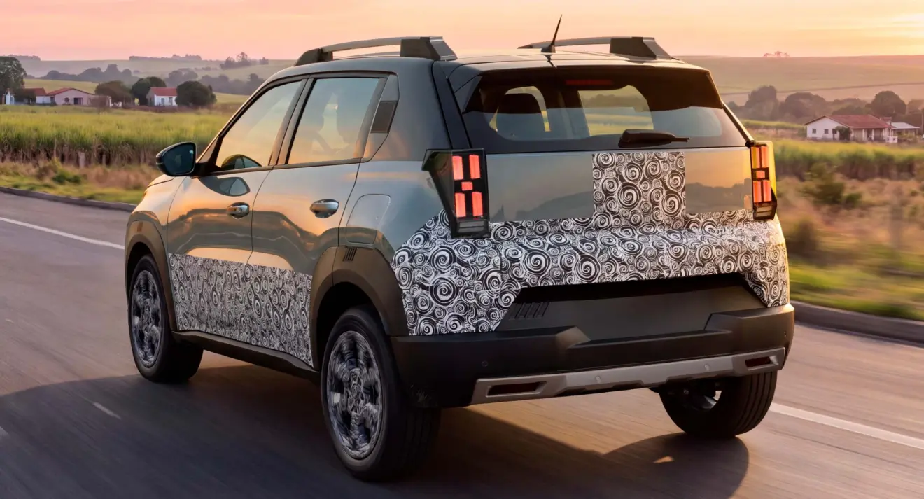 Fiat Argo X cinza de traseira em movimento